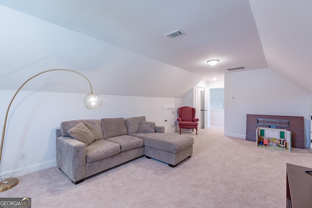 295 Graceton Farms Dr, Senoia, GA 30276 - living room with carpet flooring, vaulted ceiling, and baseboards
