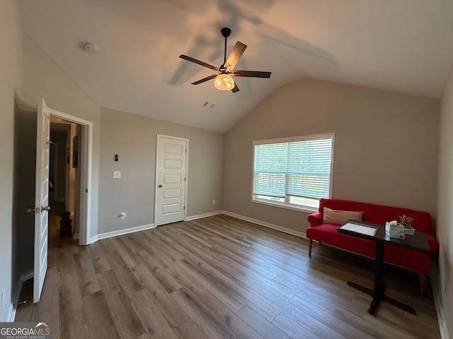 210 Fenwick Farm Dr, Lagrange, GA 30241 - living area featuring vaulted ceiling, a ceiling fan, wood finished floors, and baseboards