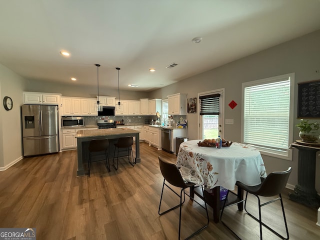 210 Fenwick Farm Dr, Lagrange, GA 30241 - dining room featuring dark wood-type flooring, recessed lighting, and baseboards