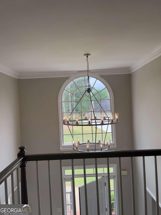 detailed view of a chandelier and ornamental molding