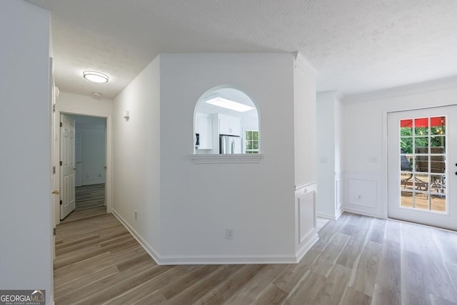 3350 Serenade Ct, Alpharetta, GA 30004 - corridor featuring a textured ceiling and light wood-style floors