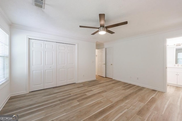 3350 Serenade Ct, Alpharetta, GA 30004 - unfurnished bedroom with light wood-type flooring, ornamental molding, baseboards, ensuite bathroom, and a closet