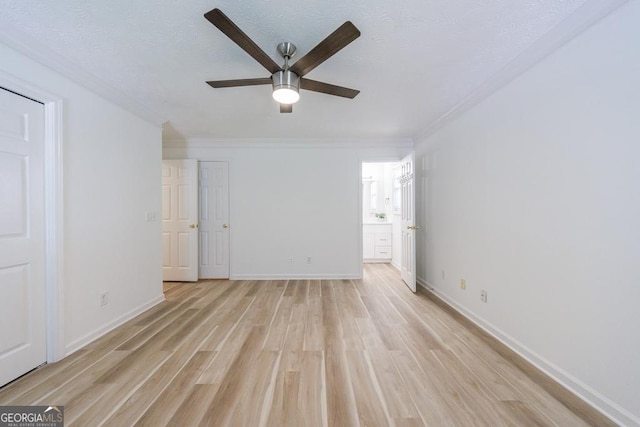 3350 Serenade Ct, Alpharetta, GA 30004 - unfurnished room featuring ceiling fan, light wood finished floors, ornamental molding, baseboards, and a textured ceiling