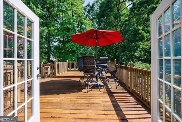 3350 Serenade Ct, Alpharetta, GA 30004 - deck with outdoor dining space and view of scattered trees