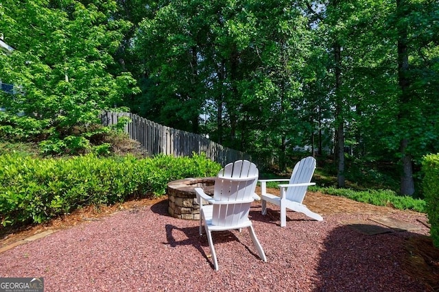3350 Serenade Ct, Alpharetta, GA 30004 - view of yard featuring fence and a fire pit