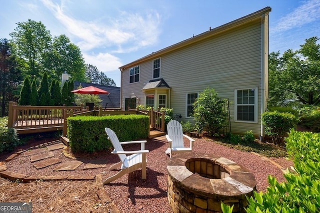 3350 Serenade Ct, Alpharetta, GA 30004 - back of property featuring a fire pit and a deck