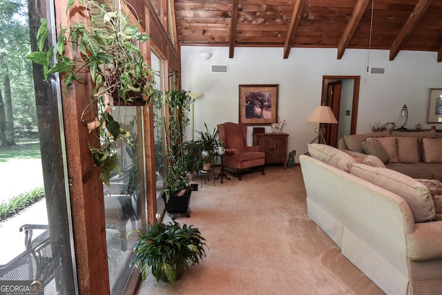 living area featuring wooden ceiling, light carpet, and healthy amount of natural light