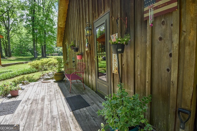doorway to property with a wooden deck