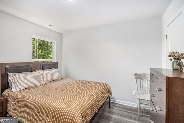 278 Lambert Overlook Cir, Carrollton, GA 30117 - bedroom featuring wood finished floors and baseboards