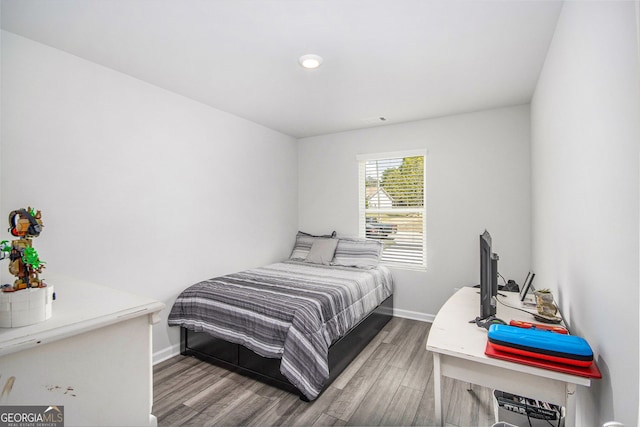 278 Lambert Overlook Cir, Carrollton, GA 30117 - bedroom featuring wood finished floors and baseboards