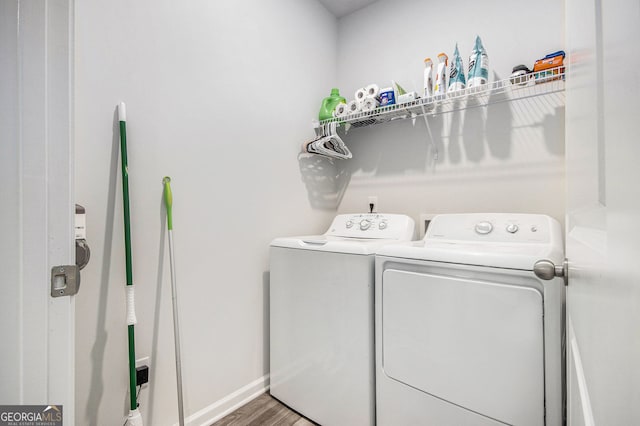 278 Lambert Overlook Cir, Carrollton, GA 30117 - washroom with washing machine and dryer, wood finished floors, and baseboards