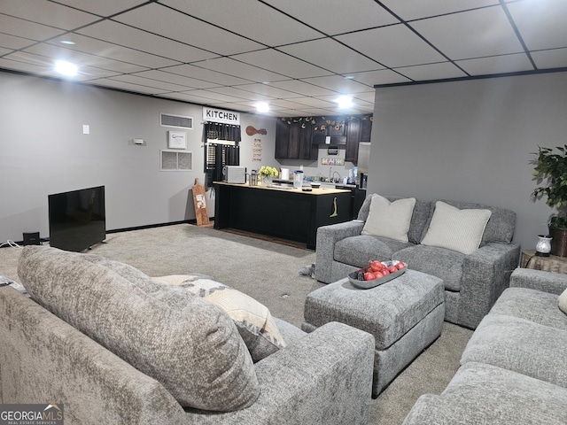 605 Smithville Church Rd, Warner Robins, GA 31088 - living area with light carpet, a drop ceiling, and bar area