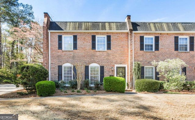 7 Stratford Dr, Athens, GA 30605 - view of front of property featuring roof with shingles, brick siding, and mansard roof