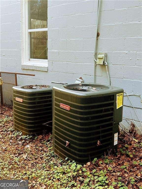1639 Orlando St SW, Atlanta, GA 30311 - exterior view of cooling unit and concrete block siding