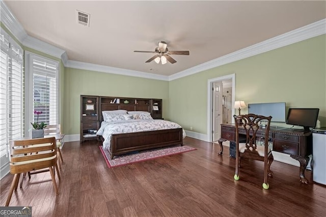 bedroom with dark wood finished floors, ornamental molding, baseboards, and a ceiling fan