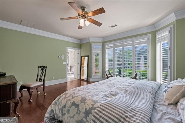 9325 Saint Georgen Cmn, Duluth, GA 30097 - bedroom featuring wood finished floors, ornamental molding, and a ceiling fan