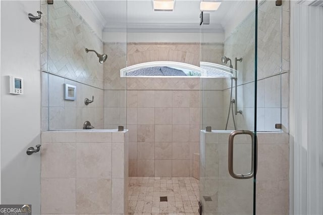bathroom featuring a stall shower and crown molding