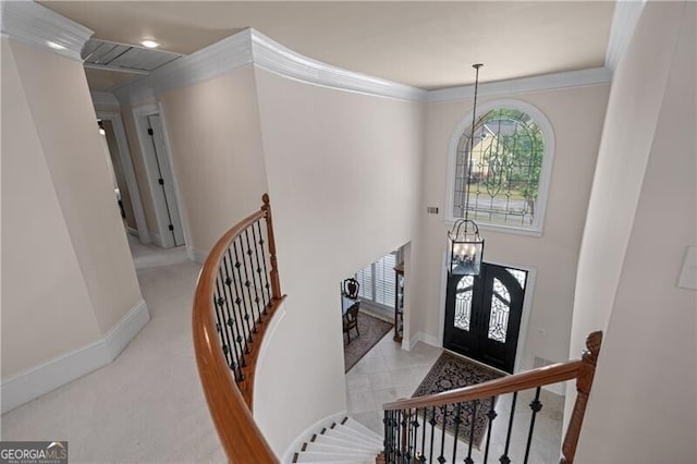 9325 Saint Georgen Cmn, Duluth, GA 30097 - foyer entrance with crown molding and a chandelier