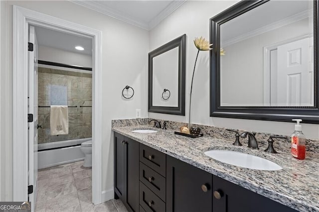 bathroom with toilet, double vanity, bath / shower combo with glass door, ornamental molding, and tile patterned floors