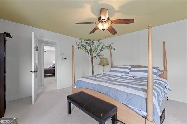 bedroom featuring light colored carpet, baseboards, ceiling fan, and ornamental molding
