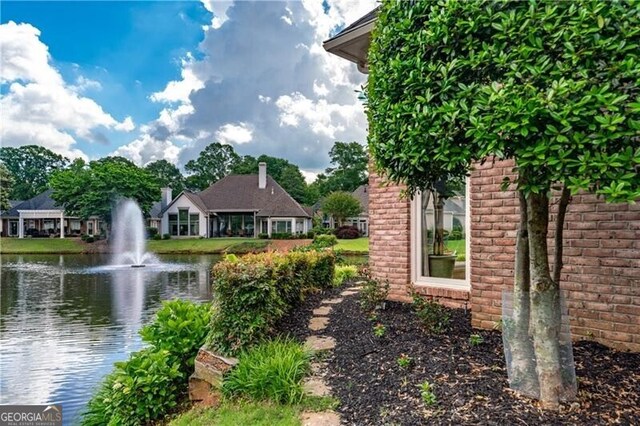 9325 Saint Georgen Cmn, Duluth, GA 30097 - view of yard with a water view