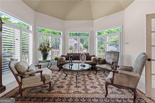 9325 Saint Georgen Cmn, Duluth, GA 30097 - tiled living area featuring vaulted ceiling and baseboards