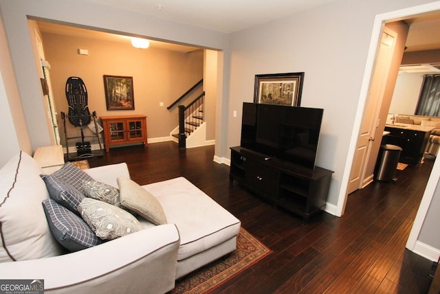 116 Festoon Ct, Smyrna, GA 30080 - living room featuring stairs, wood finished floors, and baseboards