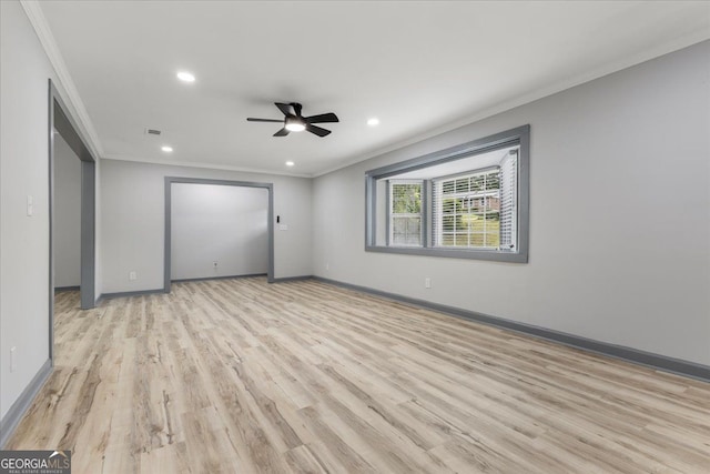 unfurnished room featuring ornamental molding, light wood-style flooring, recessed lighting, baseboards, and a ceiling fan