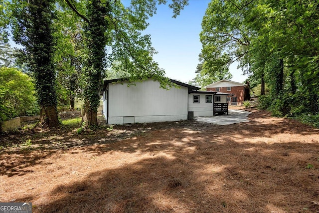 rear view of house with a patio
