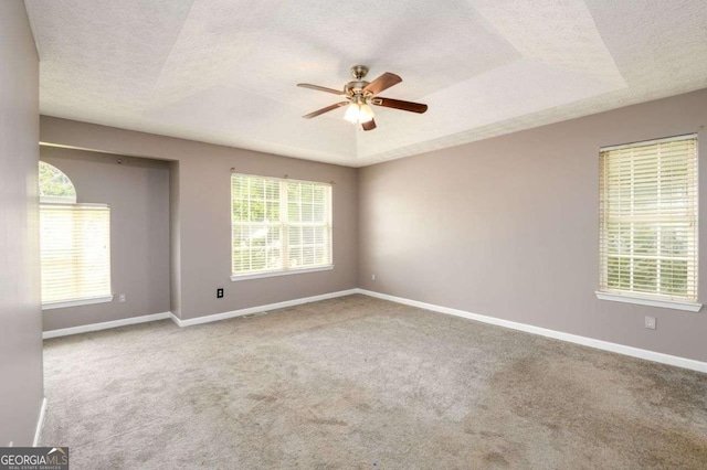 3730 Warriors Path, Decatur, GA 30034 - spare room with a textured ceiling, a ceiling fan, healthy amount of natural light, carpet floors, and baseboards