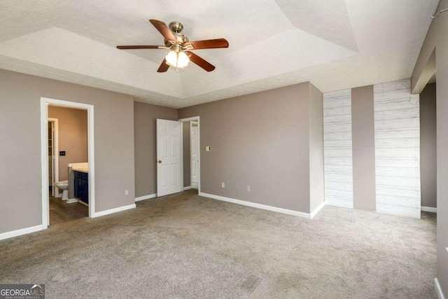 3730 Warriors Path, Decatur, GA 30034 - unfurnished bedroom featuring carpet flooring, a tray ceiling, baseboards, and ensuite bath