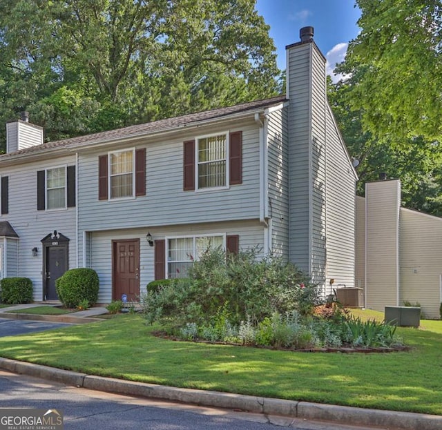 6359 Wedgeview Dr, Tucker, GA 30084 - view of front of property featuring a chimney and a front yard