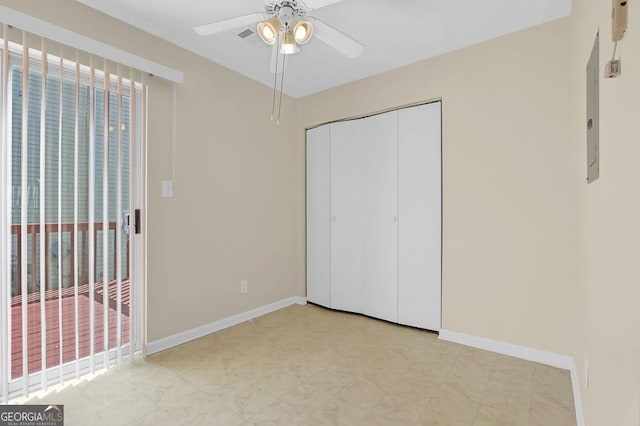 6359 Wedgeview Dr, Tucker, GA 30084 - unfurnished bedroom featuring light floors, baseboards, a closet, and ceiling fan