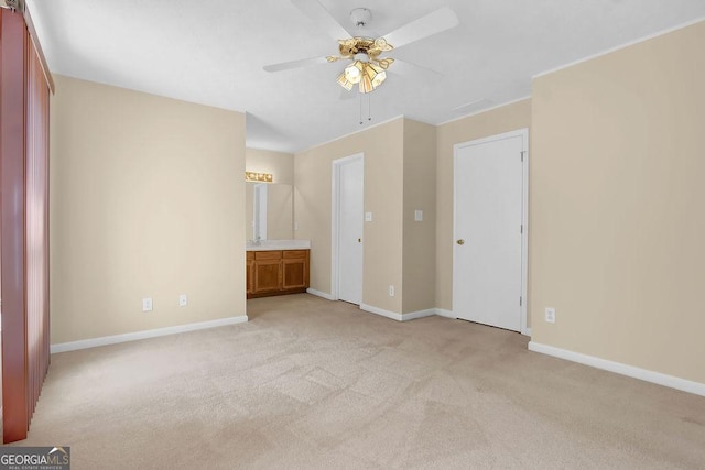 6359 Wedgeview Dr, Tucker, GA 30084 - unfurnished bedroom featuring light carpet, baseboards, and connected bathroom