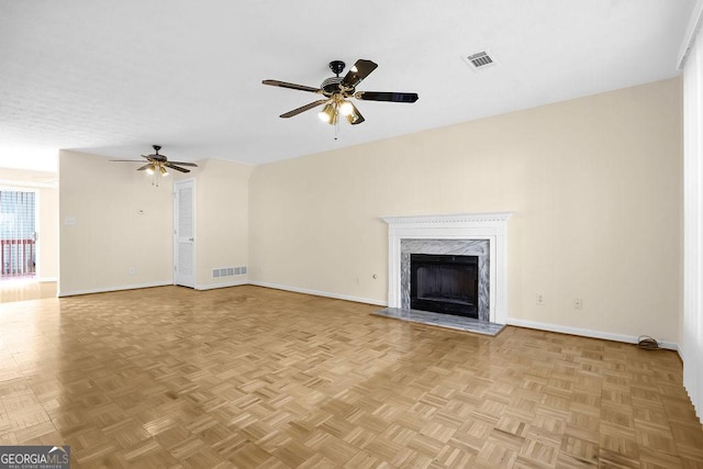 6359 Wedgeview Dr, Tucker, GA 30084 - unfurnished living room with a ceiling fan, baseboards, and a premium fireplace