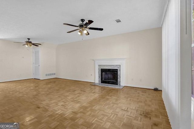 6359 Wedgeview Dr, Tucker, GA 30084 - unfurnished living room with ceiling fan, baseboards, and a premium fireplace
