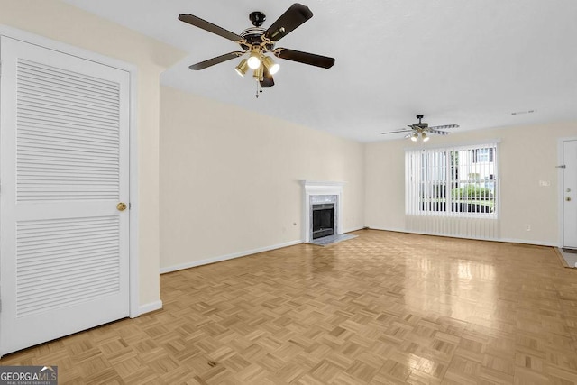 6359 Wedgeview Dr, Tucker, GA 30084 - unfurnished living room with a ceiling fan, baseboards, and a fireplace