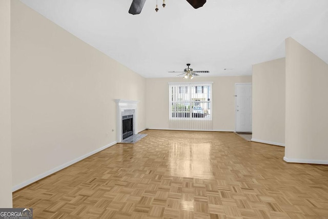 6359 Wedgeview Dr, Tucker, GA 30084 - unfurnished living room featuring a ceiling fan, baseboards, and a high end fireplace