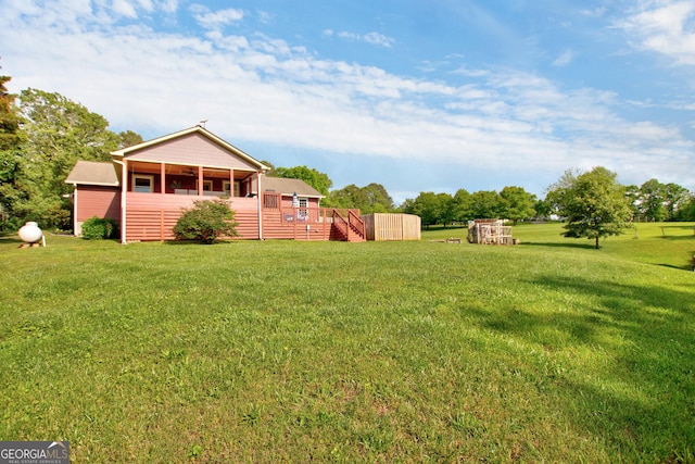 739 Rockford Creek Rd, Clarkesville, GA 30523 - view of green lawn with a deck
