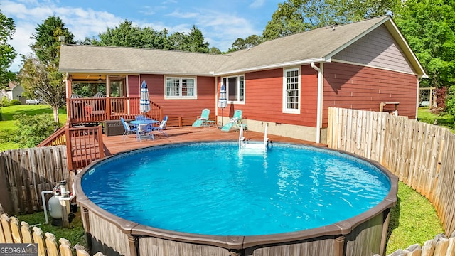 739 Rockford Creek Rd, Clarkesville, GA 30523 - outdoor pool featuring a deck and a fenced backyard
