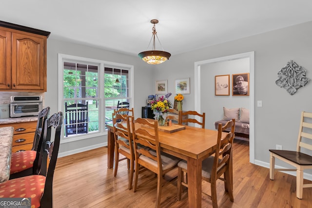 739 Rockford Creek Rd, Clarkesville, GA 30523 - dining space featuring light wood-style flooring and baseboards