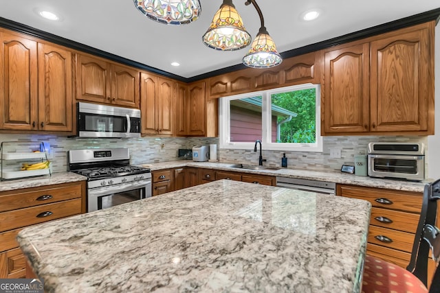 739 Rockford Creek Rd, Clarkesville, GA 30523 - kitchen featuring appliances with stainless steel finishes, brown cabinetry, light stone counters, a sink, and recessed lighting