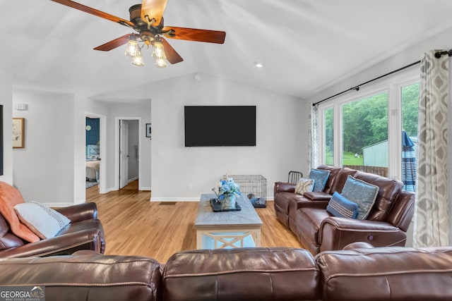 739 Rockford Creek Rd, Clarkesville, GA 30523 - living room featuring ceiling fan, vaulted ceiling, light wood-type flooring, and baseboards