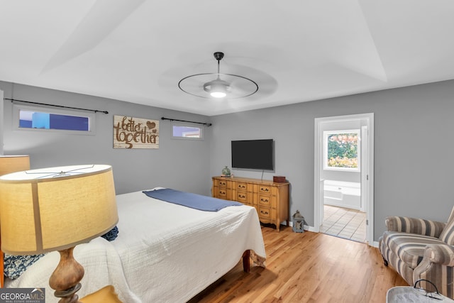 739 Rockford Creek Rd, Clarkesville, GA 30523 - bedroom featuring light wood finished floors and connected bathroom