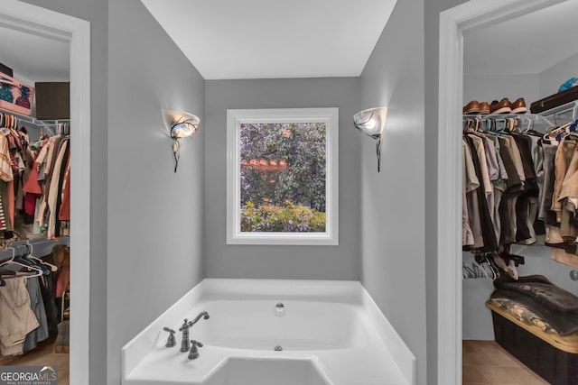 739 Rockford Creek Rd, Clarkesville, GA 30523 - bathroom with a bath and a spacious closet