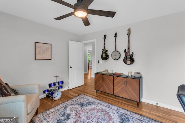 739 Rockford Creek Rd, Clarkesville, GA 30523 - living area with ceiling fan, light wood-style floors, and baseboards