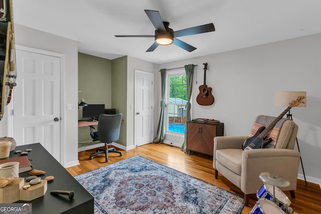 739 Rockford Creek Rd, Clarkesville, GA 30523 - office featuring a ceiling fan, wood finished floors, and baseboards