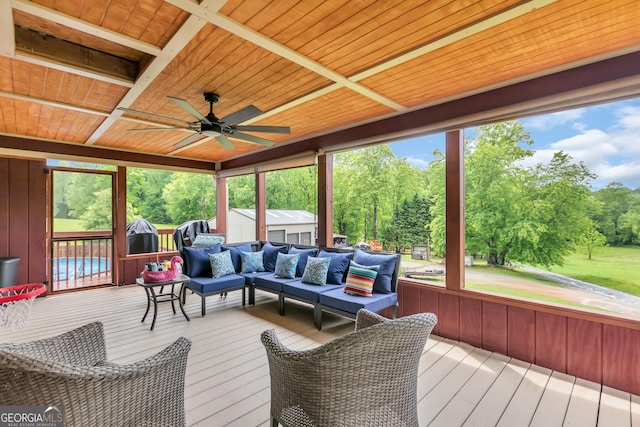 739 Rockford Creek Rd, Clarkesville, GA 30523 - sunroom / solarium featuring ceiling fan, outdoor lounge area, and view of scattered trees