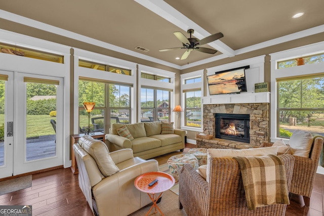 living area with a ceiling fan, recessed lighting, a fireplace, and wood-type flooring