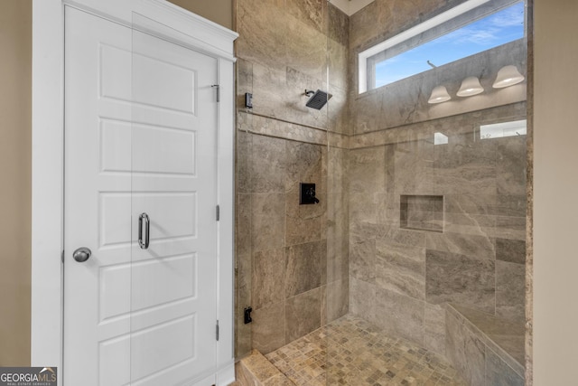 bathroom with a stall shower